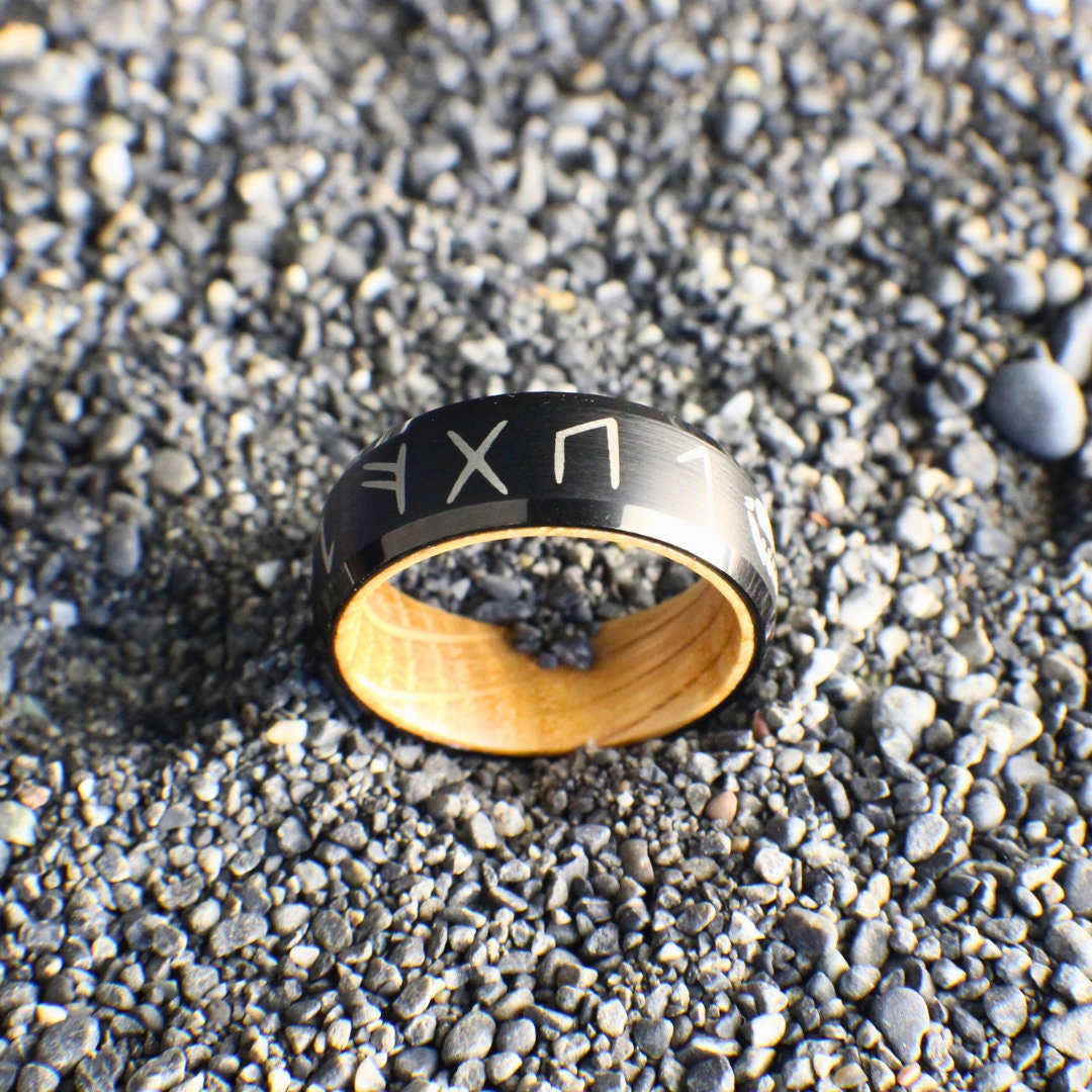 Wedding band with ancient Norse symbols