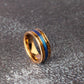 Rose Gold ring with blue fishing line and whiskey wood. Mens Wedding Ring