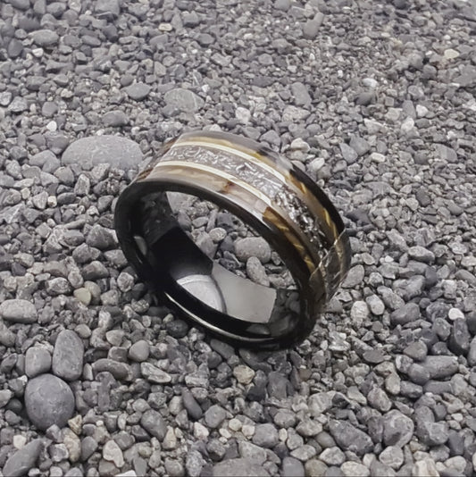 Zirconium Meteorite ring features an inlay of genuine meteorite.